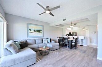 1070 Woodshire Ln-Unit -E103 in Naples, FL - Building Photo - Building Photo