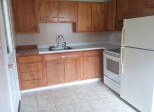 122 Pleasant St, Unit 3 in Franklin, NH - Building Photo - Building Photo