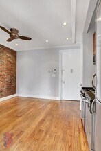 47 E 1st St in New York, NY - Building Photo - Building Photo