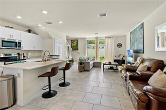 14026 Oviedo Pl in Tice, FL - Building Photo - Building Photo