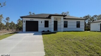 1051 Marine Ave S in Lehigh Acres, FL - Building Photo