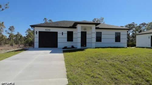 1051 Marine Ave S in Lehigh Acres, FL - Building Photo