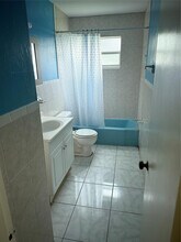 1477 NW 12th Ave in Sunrise, FL - Building Photo - Building Photo