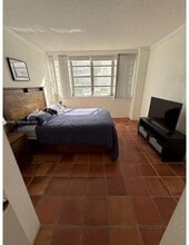 1408 Brickell Bay Dr, Unit 105 in Miami, FL - Foto de edificio - Building Photo