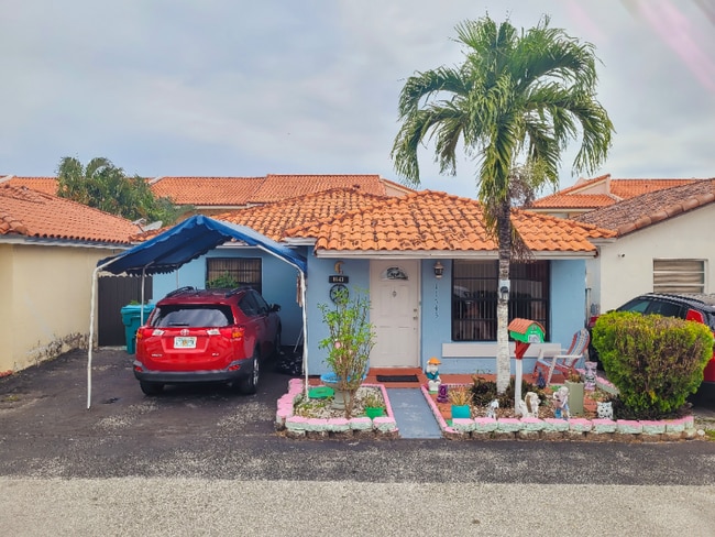 property at 11543 SW 6th St