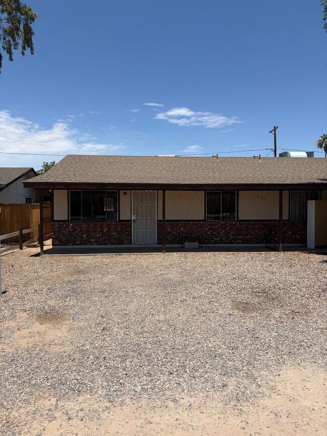 property at 7132 E Broadway Rd
