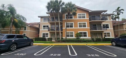 9001 Wiles Rd in Coral Springs, FL - Building Photo - Building Photo