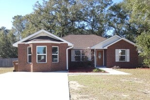 6607 Woodbury Forest Dr in Milton, FL - Building Photo