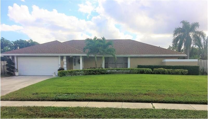 1873 Hollyhock Rd in Wellington, FL - Foto de edificio