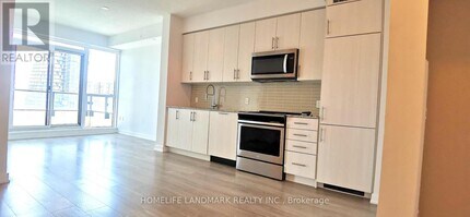 4055-4055 Parkside Village Dr in Mississauga, ON - Building Photo - Building Photo