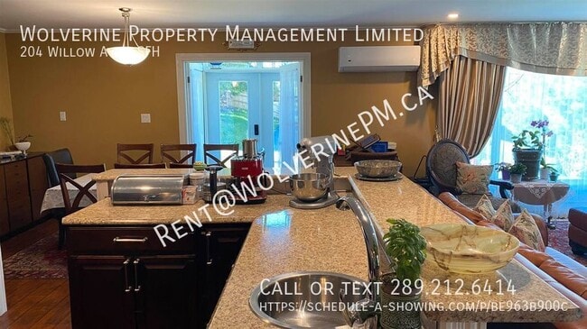 A beautiful home at the top of the hill, across the river from downtown in New Glasgow, NS - Building Photo - Building Photo