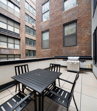 Luxurious 2BD Penthouse (+Washer&Dryer, Roof) in New York, NY - Building Photo - Building Photo