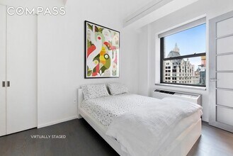 18-20 Pine St, Unit 2704 in New York, NY - Foto de edificio - Building Photo