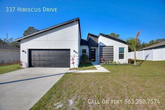 337 Hibiscus Dr in Poinciana, FL - Building Photo - Building Photo