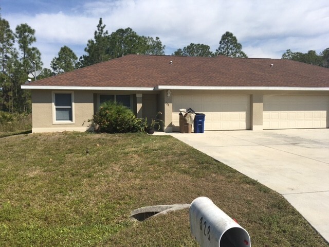 326-328 Justice Ave in Lehigh Acres, FL - Building Photo