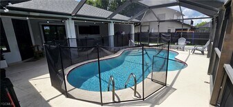 933 SW Santa Barbara Pl in Cape Coral, FL - Building Photo