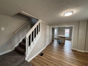 668 Sullivan St, Unit A in Elmira, NY - Foto de edificio - Building Photo