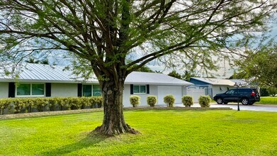3100 Indian Trail in Atlantis, FL - Building Photo - Building Photo