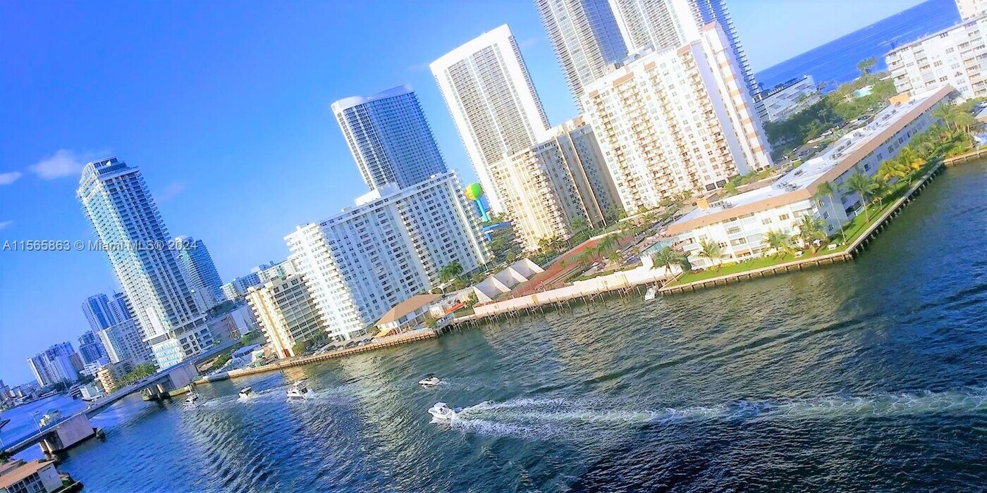 121 Golden Isles Dr, Unit 405 in Hallandale Beach, FL - Building Photo