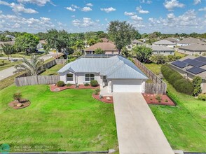 1598 SW Curry St in Port St. Lucie, FL - Building Photo - Building Photo