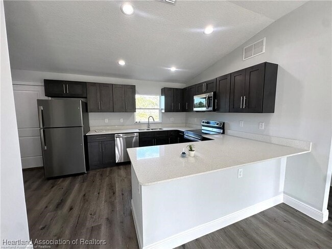 4026 Mendoza Ave in Sebring, FL - Foto de edificio - Building Photo