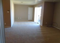 Living area + Den - Shadow Forest-Wood Apartments in Monroe, Louisiana