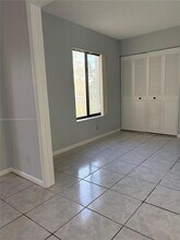 702 Sunny Pine Way in Greenacres, FL - Building Photo - Building Photo