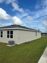 441 Eventide Ave in Mascotte, FL - Building Photo - Building Photo