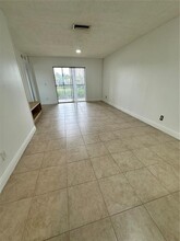 10445 NW 8th St, Unit 201 in Pembroke Pines, FL - Building Photo - Building Photo