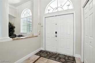 5891 Golden Oaks Ln in Naples, FL - Building Photo - Building Photo
