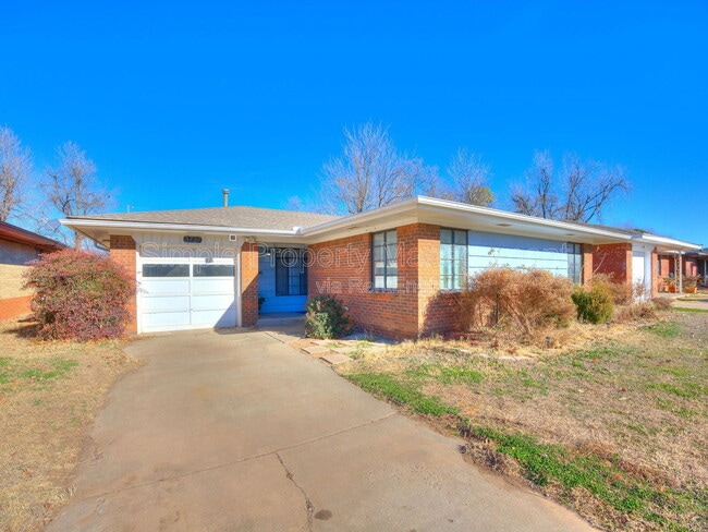 property at 3737 NW 17th St