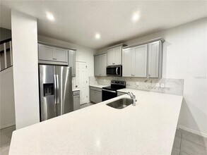 8867 Herencia Alley in Windermere, FL - Building Photo - Building Photo