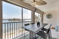 9486 Gulf Shore Dr, Unit A-202 in Naples, FL - Foto de edificio - Building Photo