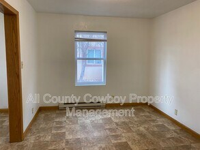 1557 W Jefferson St in Laramie, WY - Building Photo - Building Photo