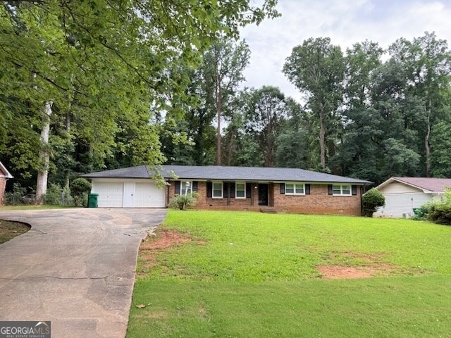 property at 4833 Thompson Mill Rd
