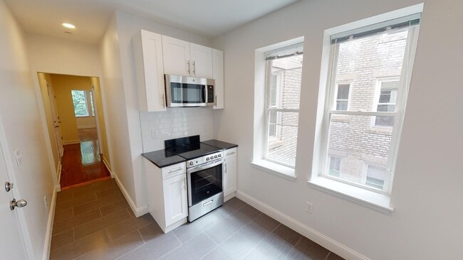 134 Sutherland Rd, Unit I in Boston, MA - Building Photo - Building Photo