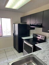 8600 N Sherman Cir, Unit 502 in Miramar, FL - Foto de edificio - Building Photo