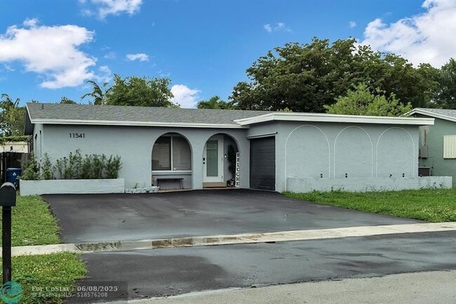 property at 11541 NW 33rd St