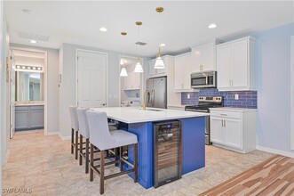 14919 Edgewater Cir in Naples, FL - Building Photo - Building Photo