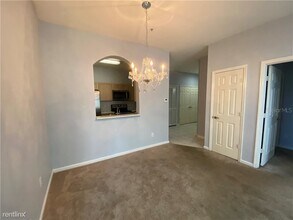 7123 Yacht Basin Ave-Unit -Apt 310 in Orlando, FL - Building Photo - Building Photo