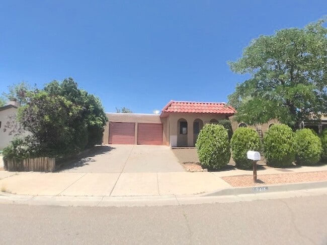 property at 10413 Guadalajara Ave NE