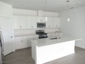 19097 Hinkley Dr in Estero, FL - Building Photo - Building Photo
