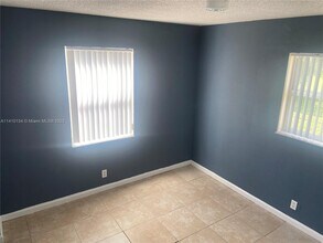 2421 NW 56th Ave, Unit 2-201 in Lauderhill, FL - Building Photo - Building Photo