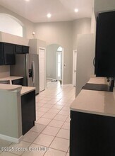 2061 12 Oaks Dr SE in Palm Bay, FL - Building Photo - Building Photo