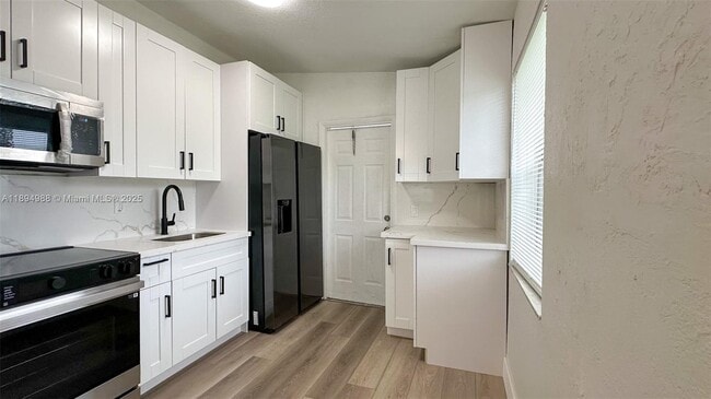 550 NW 15th Ct