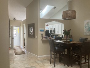 571 Milburne Close, Unit Daventry Square in Palm Harbor, FL - Building Photo - Building Photo