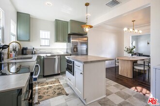 7853 Brighton Ave in Los Angeles, CA - Building Photo - Building Photo