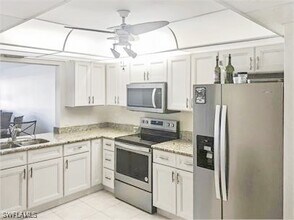 400 Misty Pines Cir in Naples, FL - Building Photo - Building Photo