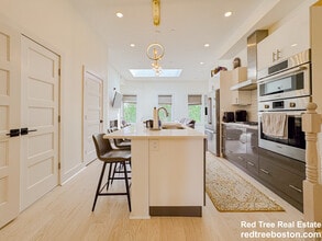 231 Maverick St, Unit PH7 in Boston, MA - Foto de edificio - Building Photo