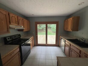 4262 Eagle Crest Dr in Williamsburg, MI - Building Photo - Building Photo